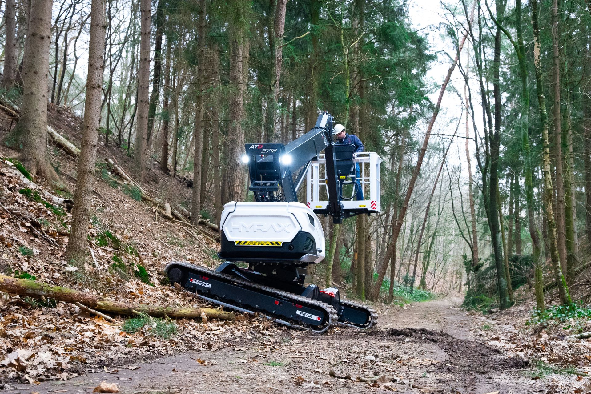 HYRAX telescopic boom lift on rough terrain at an angle